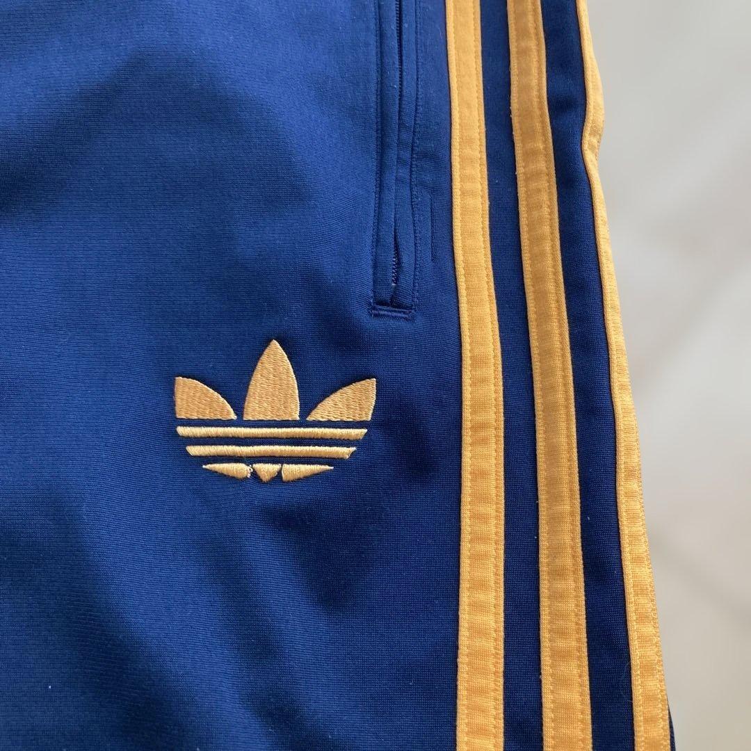 希少カラーオレンジGOLDトレフォイル×adidasオリジナルストラックパンツL