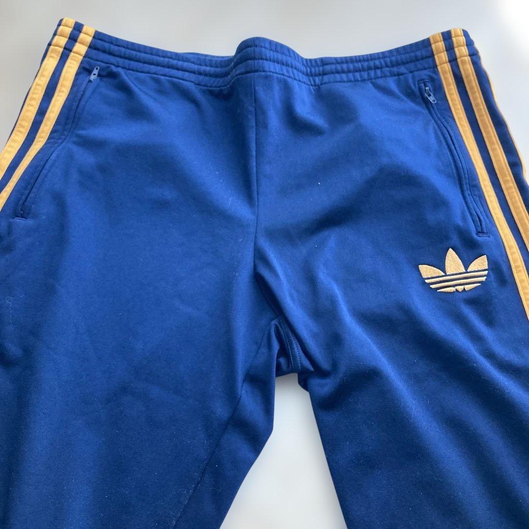 希少カラーオレンジGOLDトレフォイル×adidasオリジナルストラックパンツL