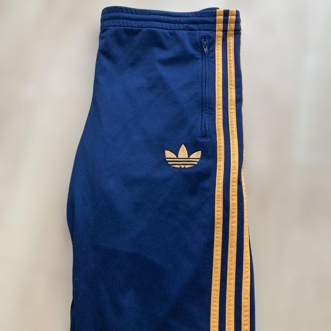 希少カラーオレンジGOLDトレフォイル×adidasオリジナルストラックパンツL