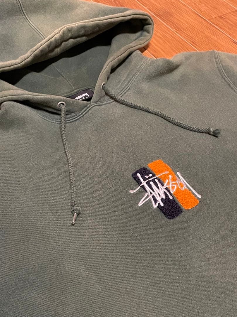 Stussy オリーブ フードスウェット