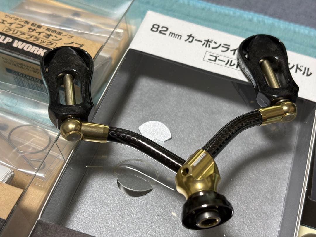 ダイワSLP WORKS カーボンライトダブルハンドル 82mm ゴールド