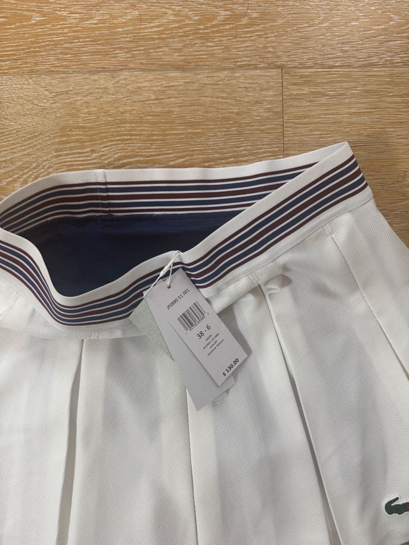 新品ラコステゴルフスカート白Lacostezoyジーフォア11号