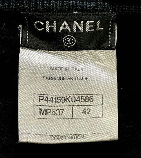 今日まで値下CHANEL黒カシミヤクリーニング済みセーター胸ロゴワッペン美品42