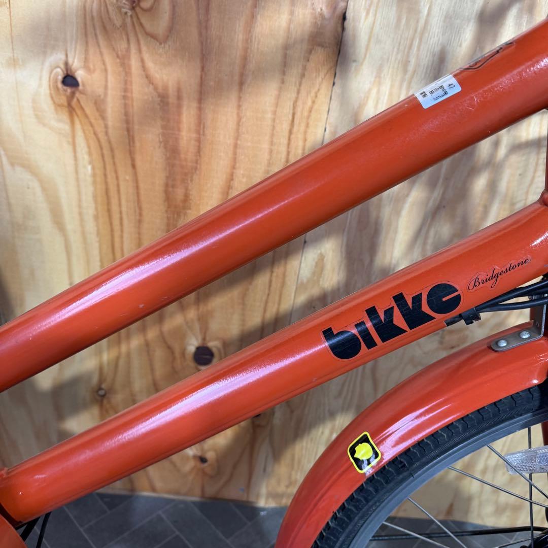 オレンジ色 電動アシスト自転車 シティタイプ