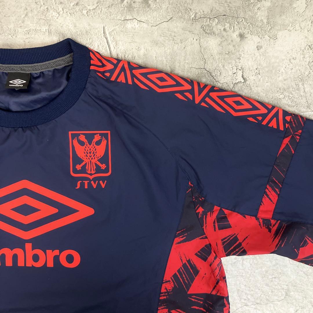 シントトロイデン STVV 長袖ピステトップ アンブロ 古着 ロゴ 紺 2XL