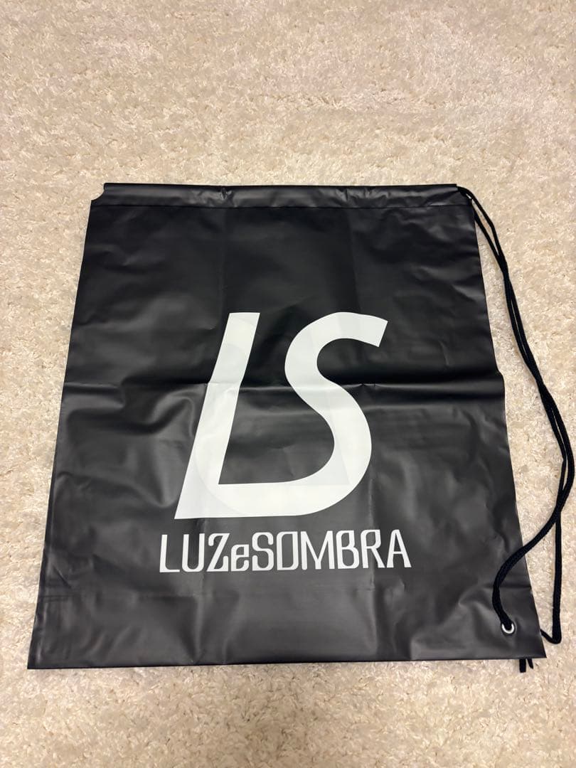 LUZ e SOMBRA ピステ・ウィンドブレーカー L カーキ