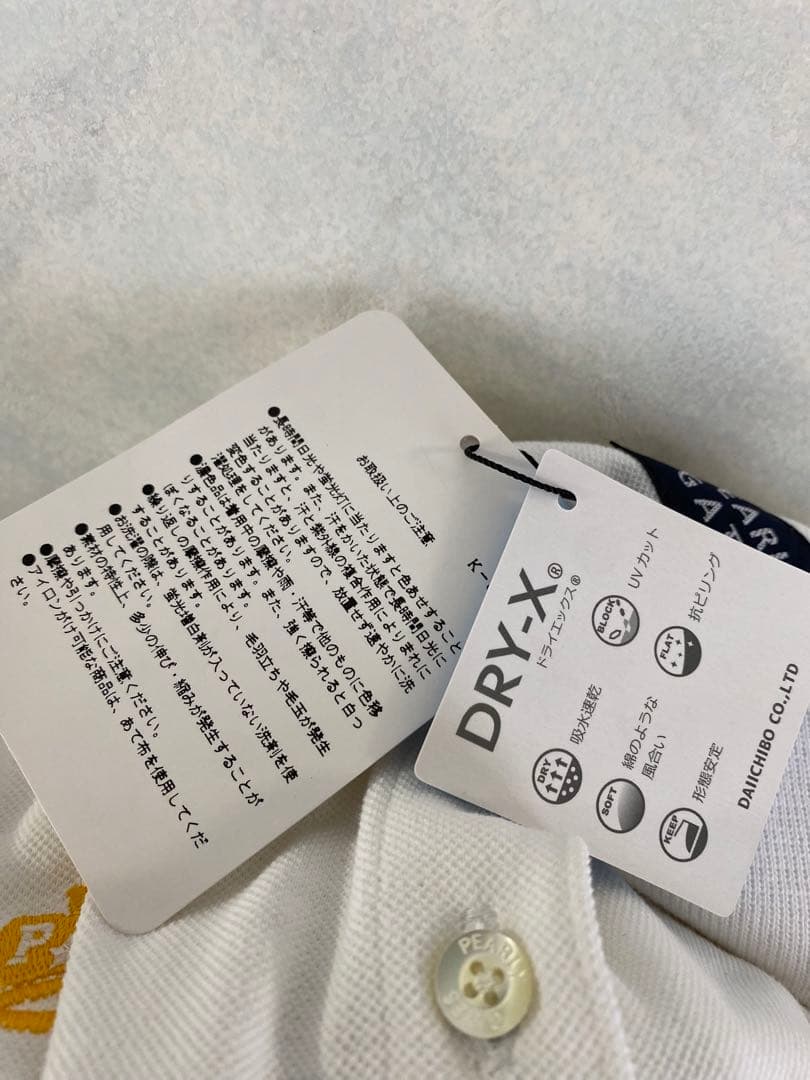 未使用品 PEARLY GATES ポロシャツ 0 レディース 迷彩 ニコちゃん
