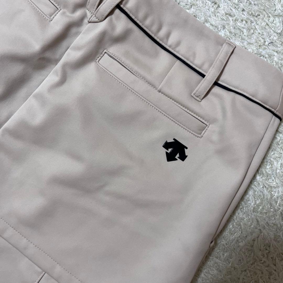 タグ付未使用　DESCENTE コーティングニットボンディングプリーツスカート